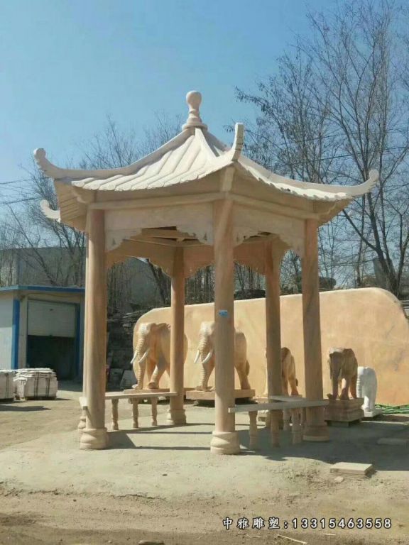 晚霞红石雕凉亭