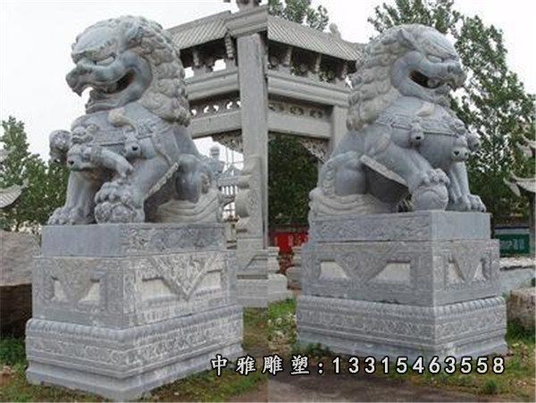 坐式狮子石雕