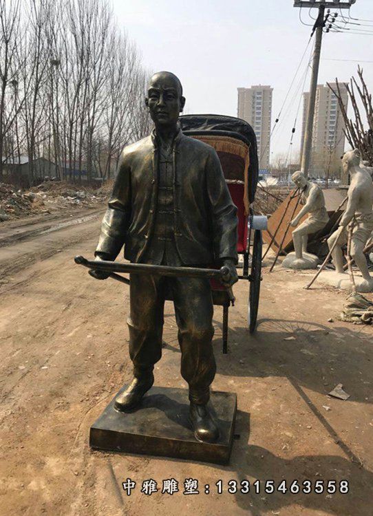 商业街拉车铜雕人物雕像