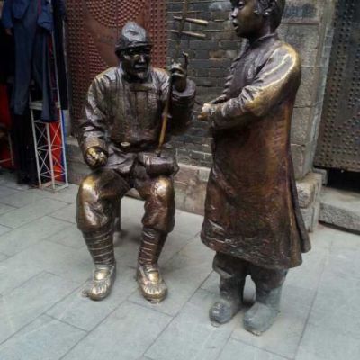 铜雕商业街唱戏人物