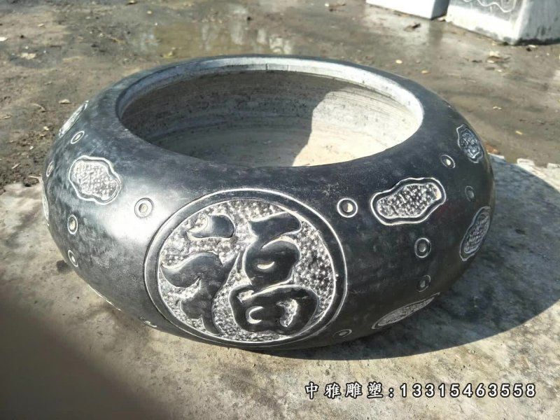 圆形石雕水缸