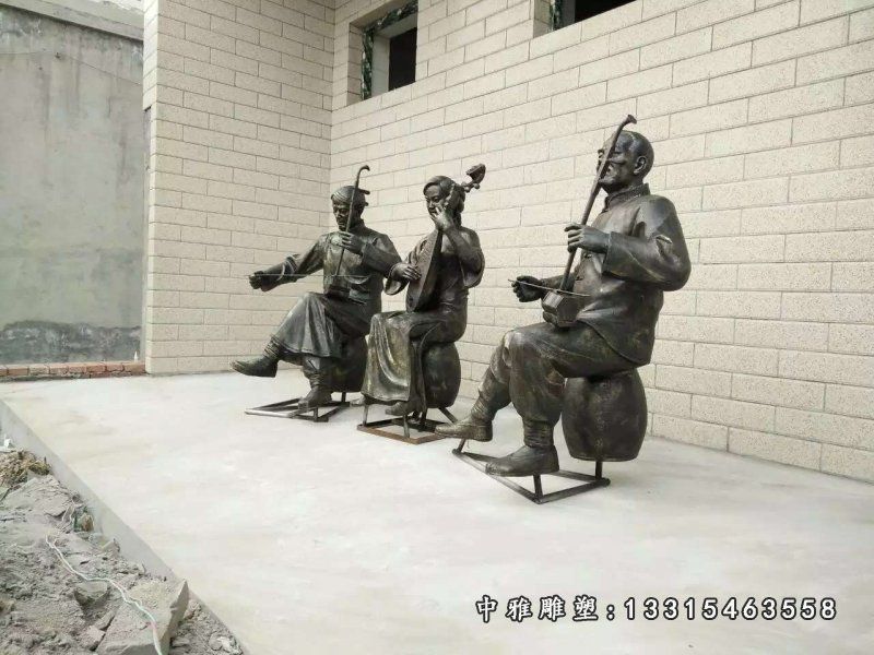 铜雕园林唱戏人物