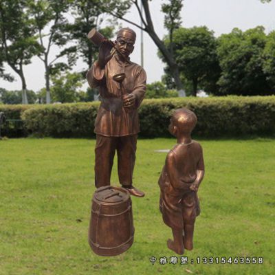 铜雕步行街打油人物