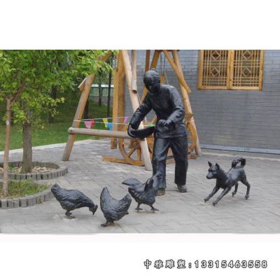 民俗铜雕喂鸡人物