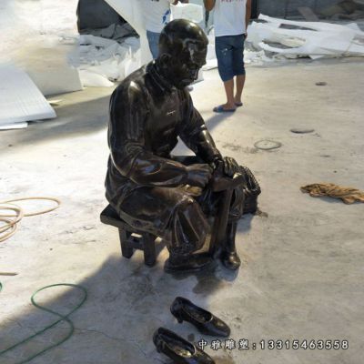 步行街修鞋匠铜雕