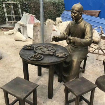 商业街铜雕吃饭人物