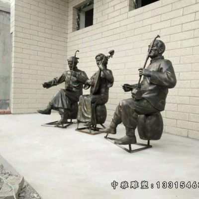 铜雕唱戏人物