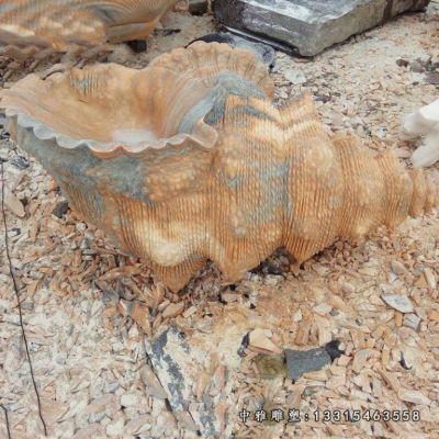 晚霞红海螺石雕