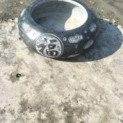 圆形石雕水缸